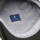(Dunkelgrün) Ballonmütze Tweed – Innenseite mit Prince Bowtie Label